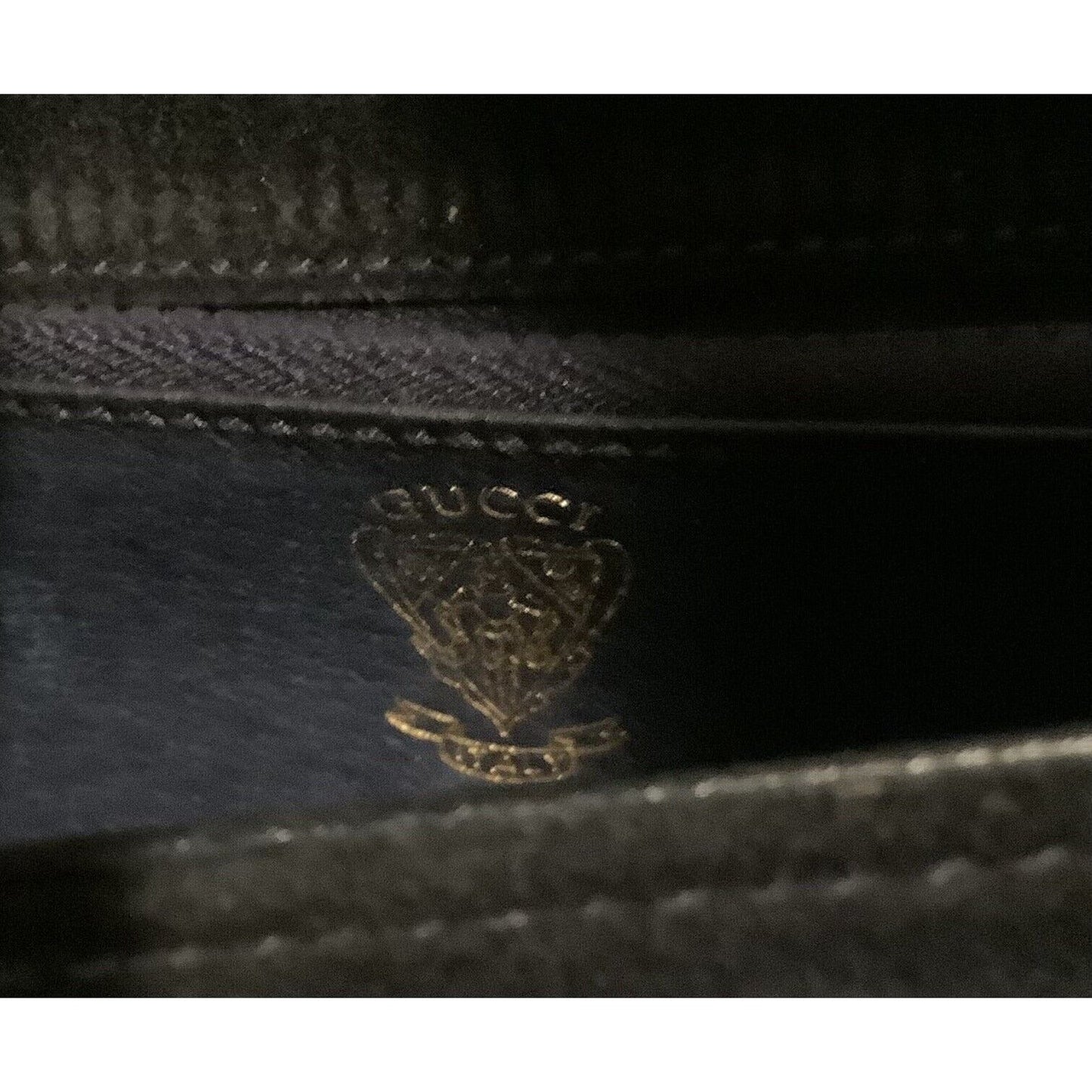 Gucci navy suede clutch w a round buckle accent