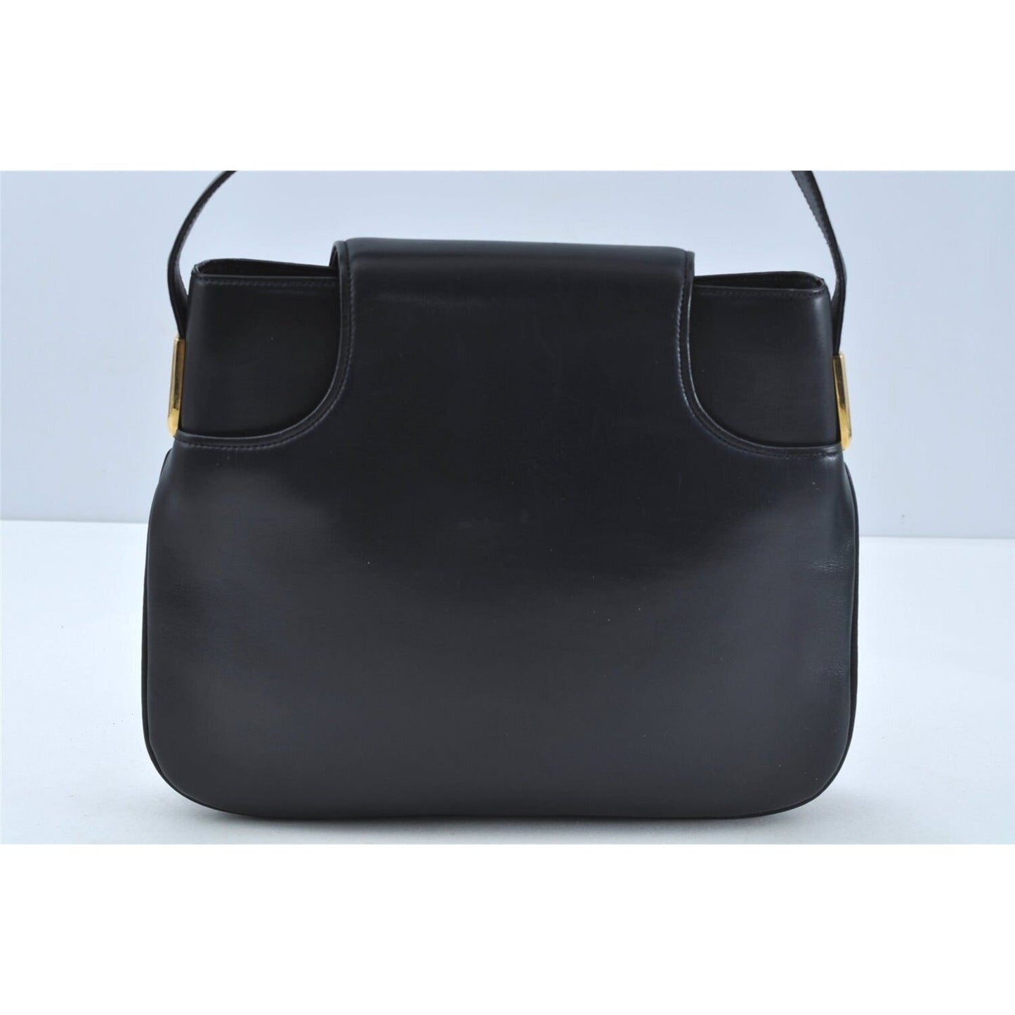 Gucci 1973 navy leather roomy handbag with a gold GG snap