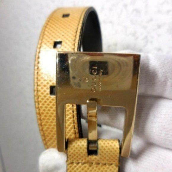 Gucci tan lizard leather belt w engraved chrome buckle