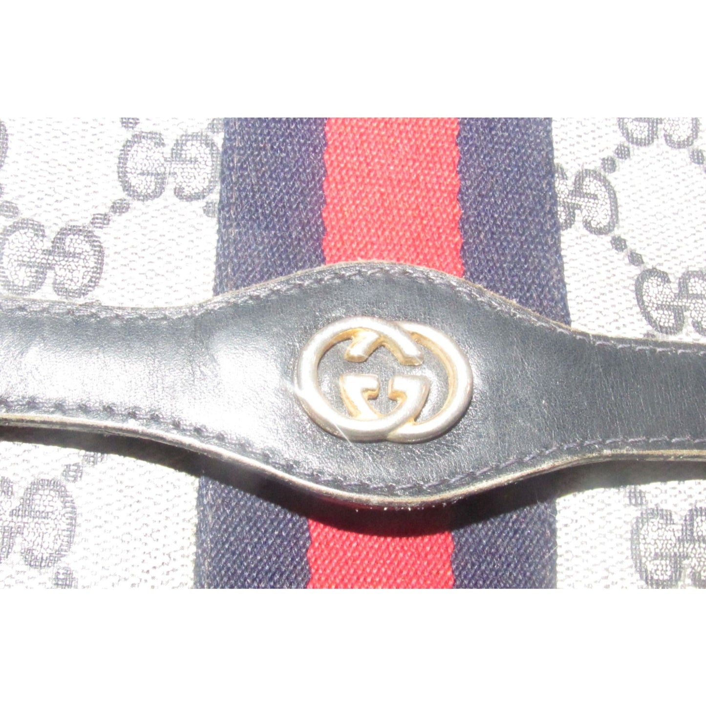 Gucci, navy Guccissima print coated canvas & leather, clutch or cosmetic bag with a red & blue Sherry striped center and envelope top