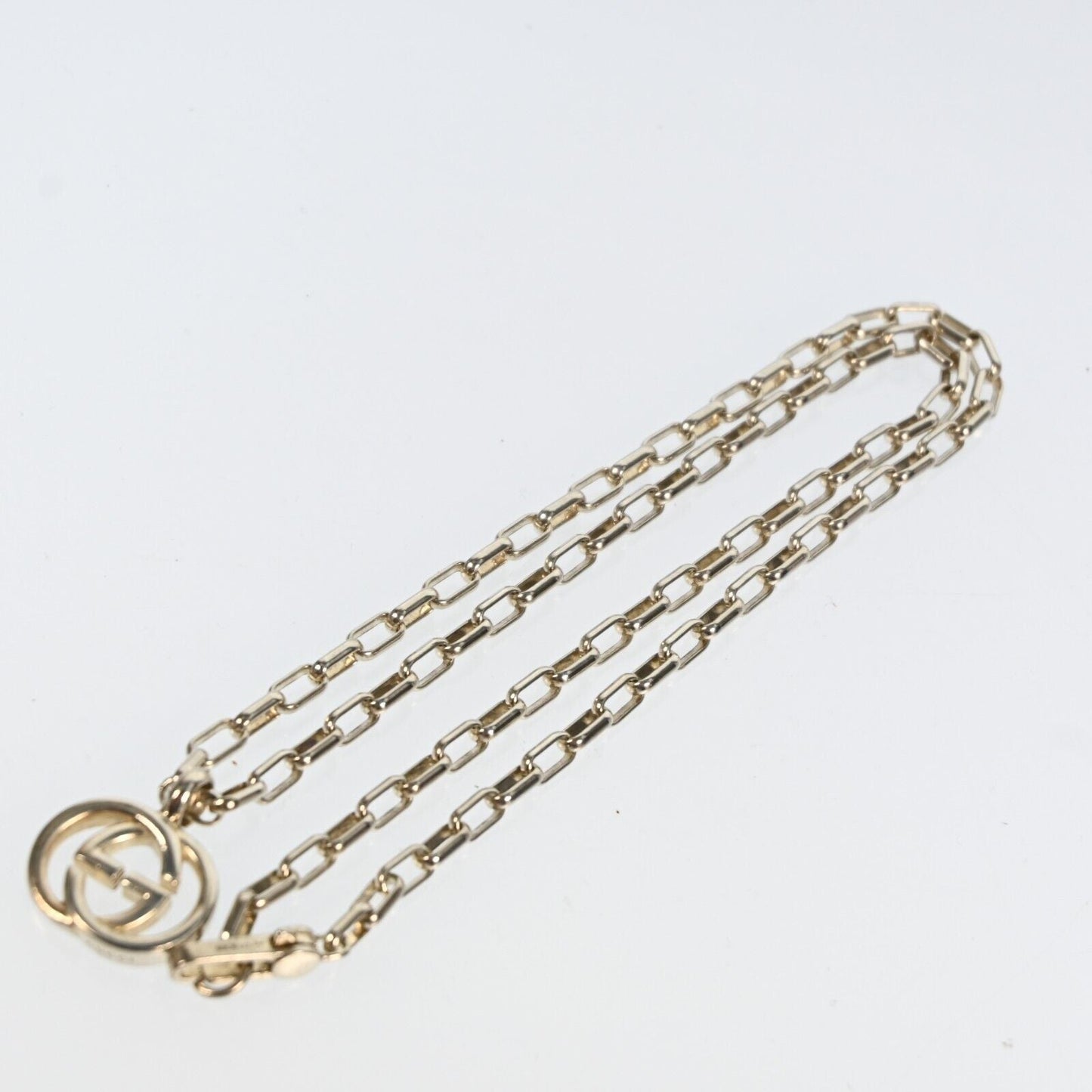 Gucci Interlocking Gg Logo Pendant