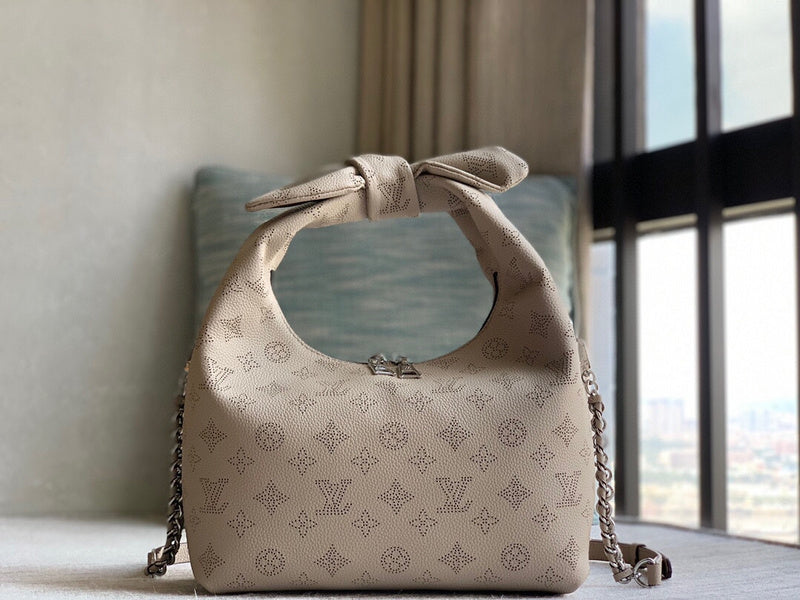 Alice Bags- Louis Vuittons  - 16385