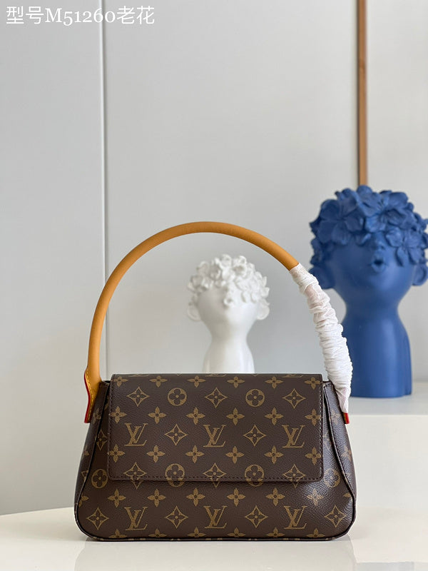 Alice Bags- Louis Vuittons  - 16625