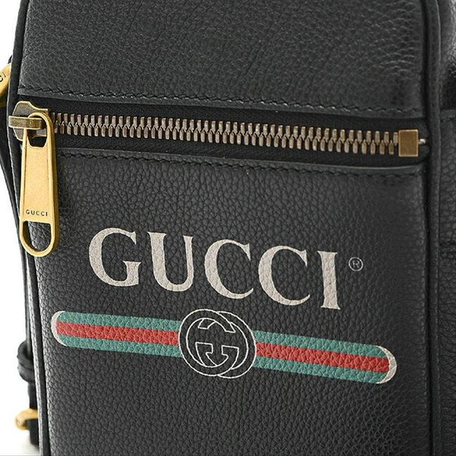 Gucci Logo Print Leather Crossbody Bag in Black