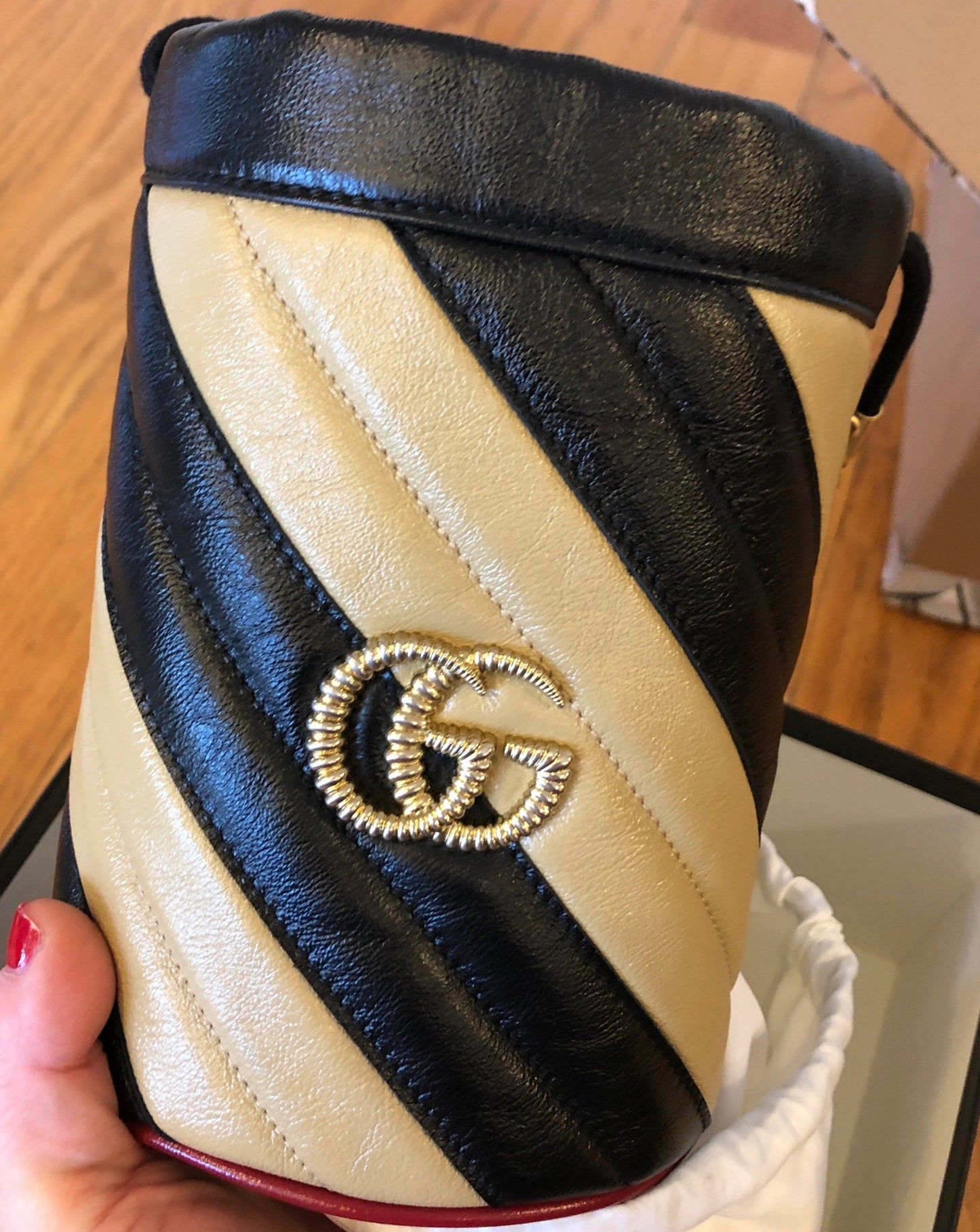 Gucci GG Marmont Bucket Bag in Black and Beige with Red Trim