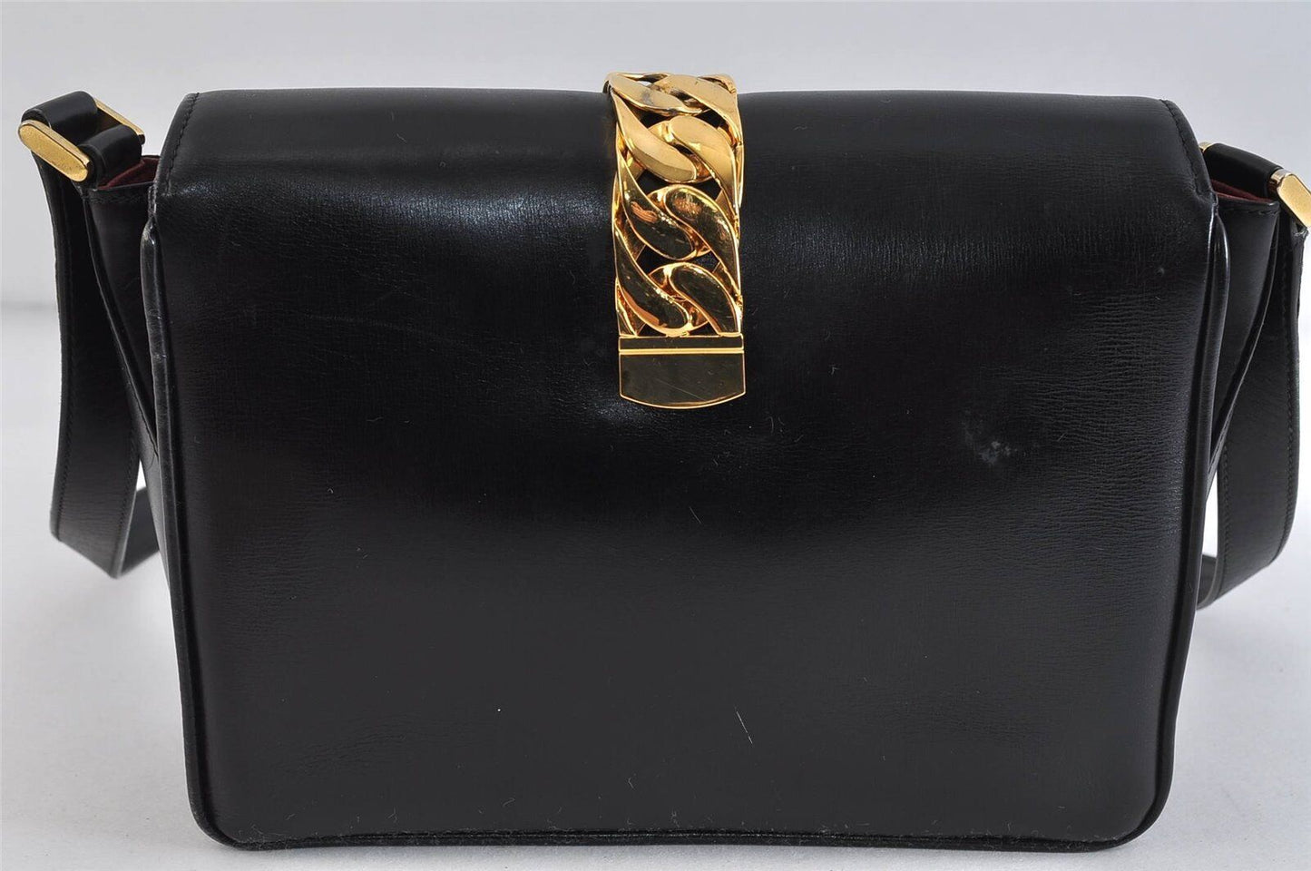 Gucci 1969 Sylvie  navy leather shoulder bag with a gold zipper accent