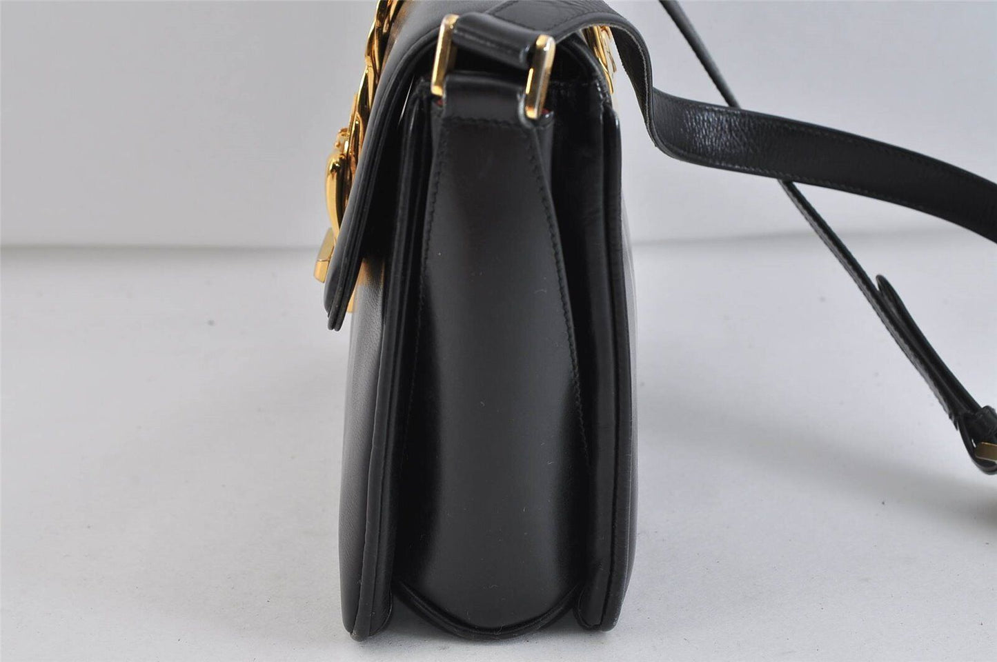 Gucci 1969 Sylvie  navy leather shoulder bag with a gold zipper accent