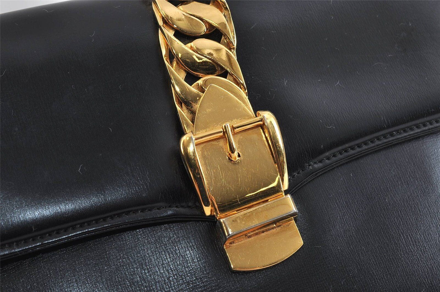 Gucci 1969 Sylvie  navy leather shoulder bag with a gold zipper accent