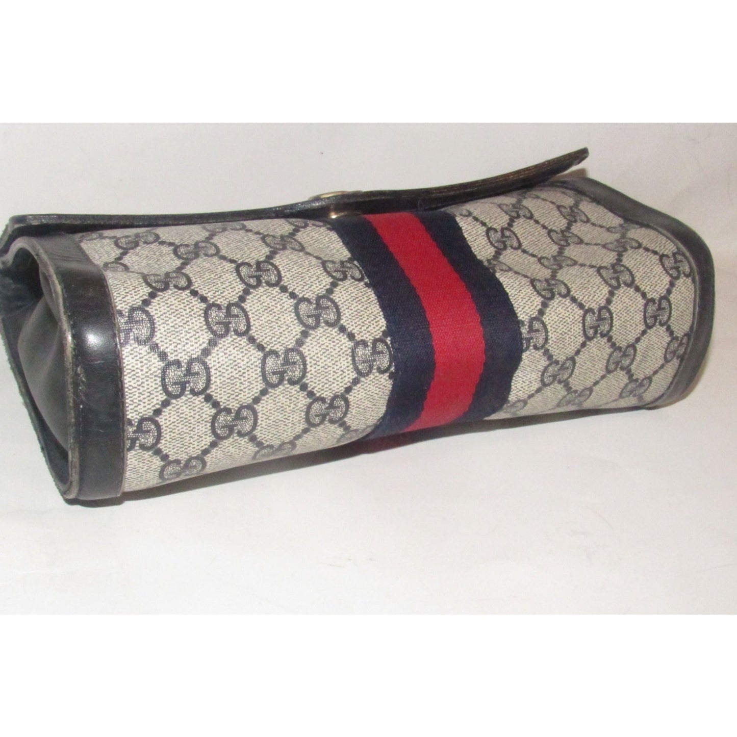 Gucci, navy Guccissima print coated canvas & leather, clutch or cosmetic bag with a red & blue Sherry striped center and envelope top