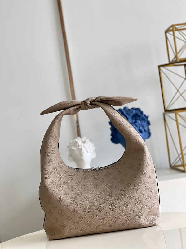 Alice Bags- Louis Vuittons  - 16363