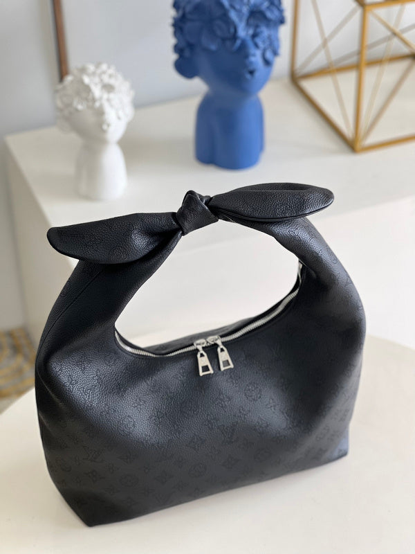 Alice Bags- Louis Vuittons  - 16362