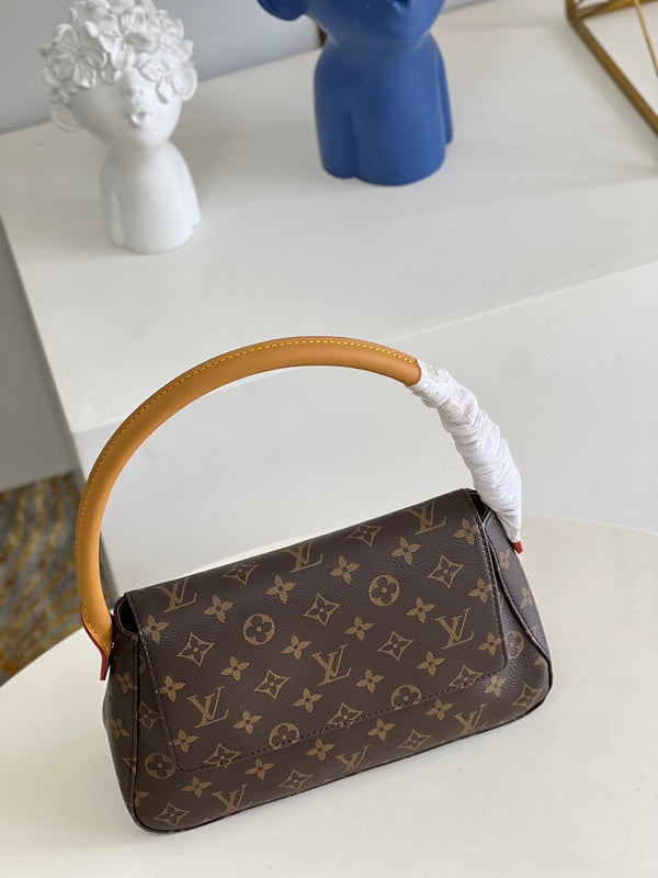Alice Bags- Louis Vuittons  - 16625