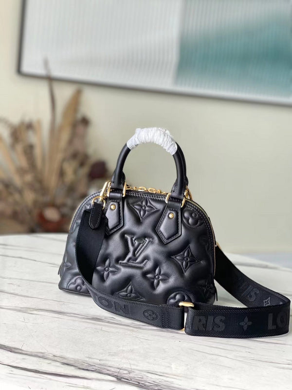 Alice Bags- Louis Vuittons  - 16618