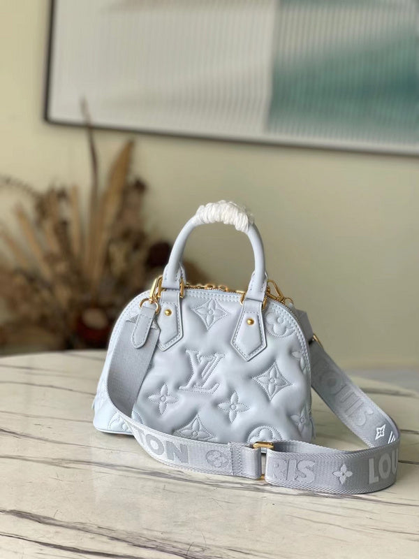 Alice Bags- Louis Vuittons  - 16617