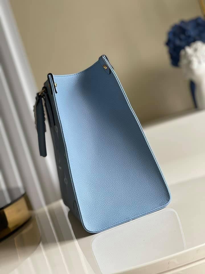 Louis Vuitton  MM Tote Bag