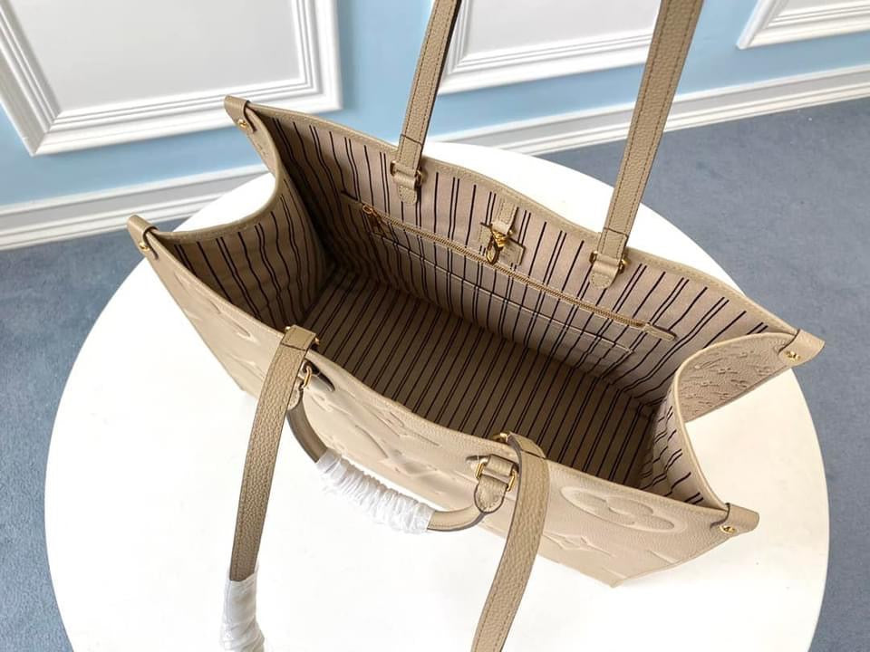 Louis Vuitton  MM Tote Bag