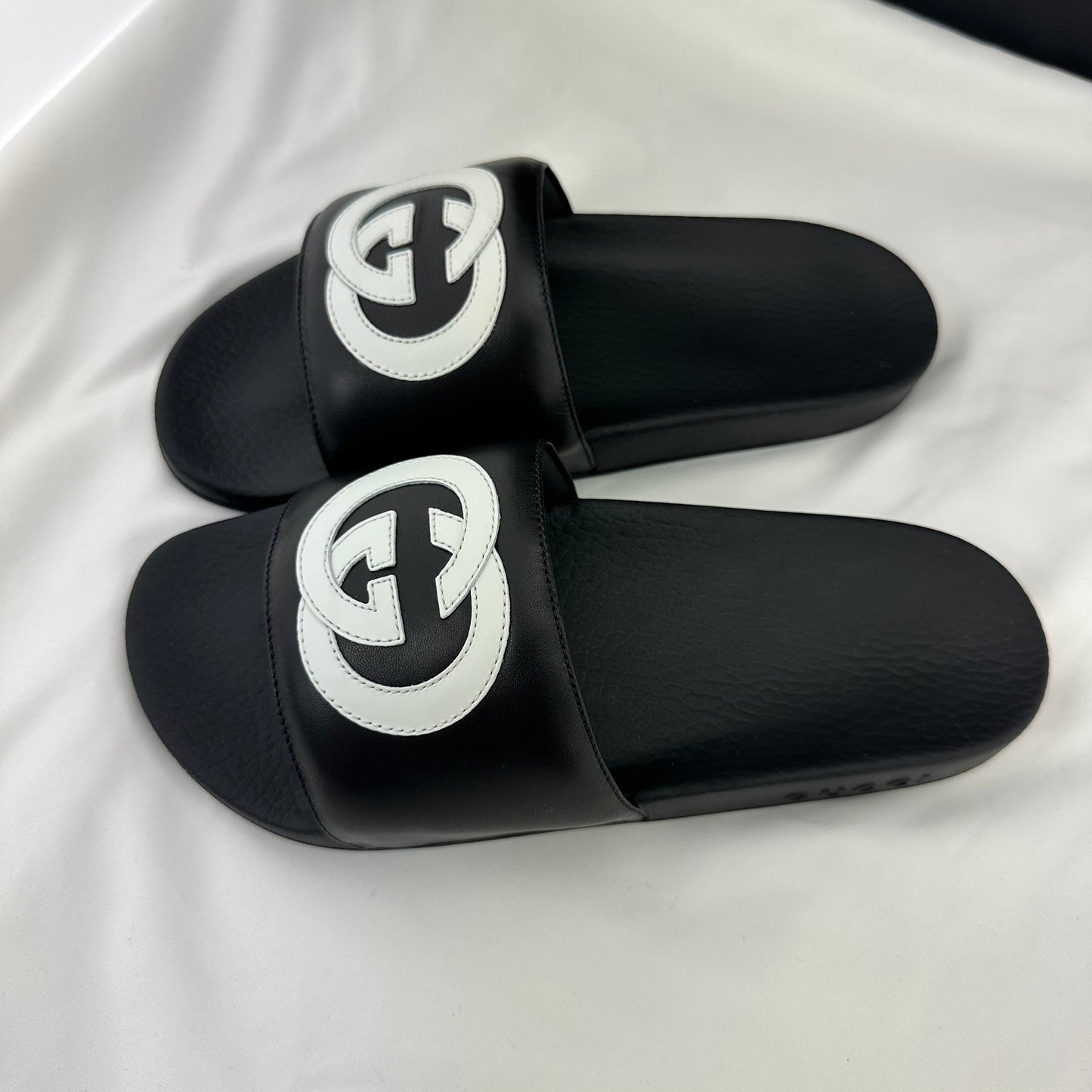 Gucci Women's Black Slides with White Interlocking GG