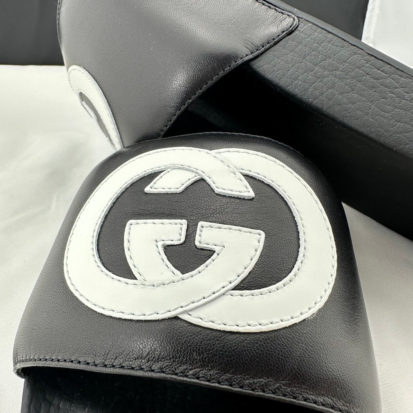 Gucci Women's Black Slides with White Interlocking GG