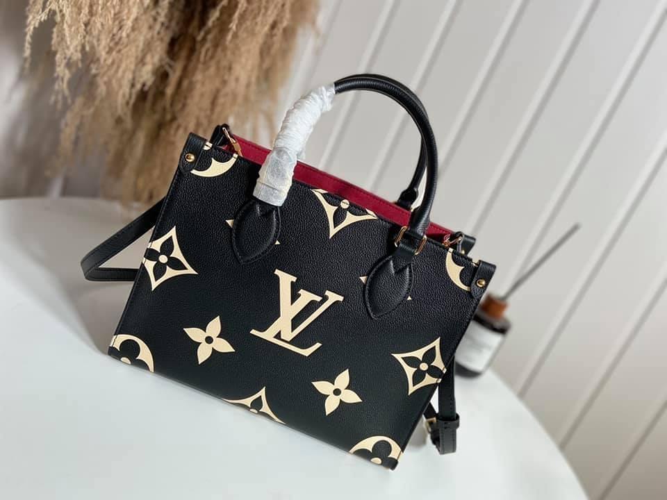 Louis Vuitton  MM Tote Bag