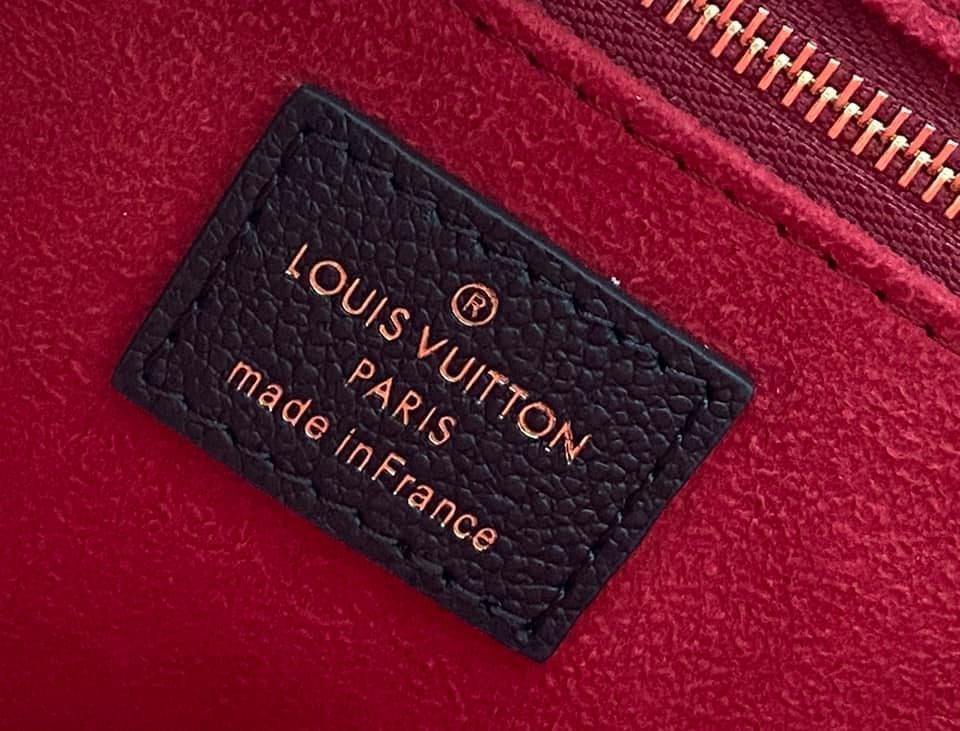 Louis Vuitton  MM Tote Bag