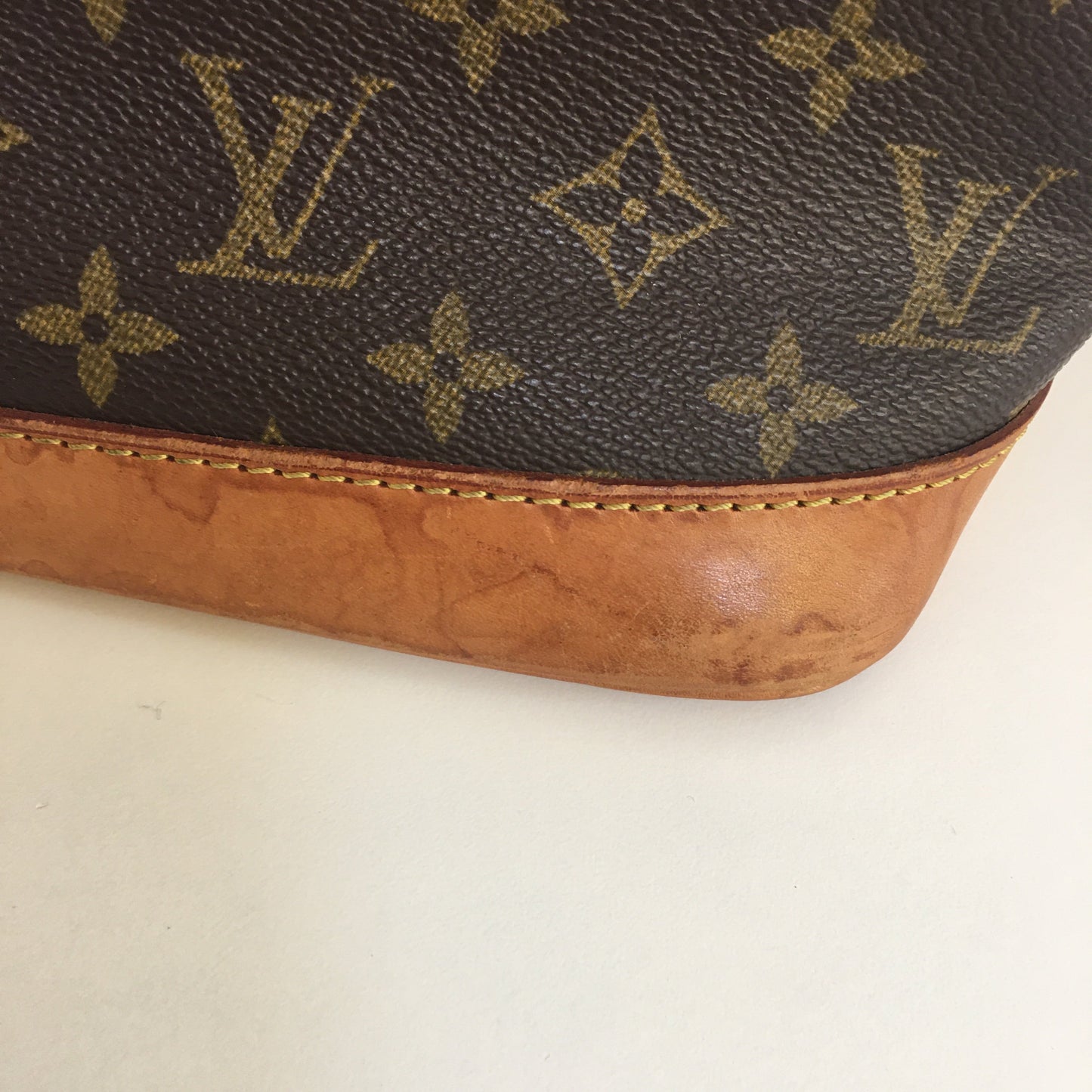 LOUIS VUITTON Alma Handbag in Brown Canvas