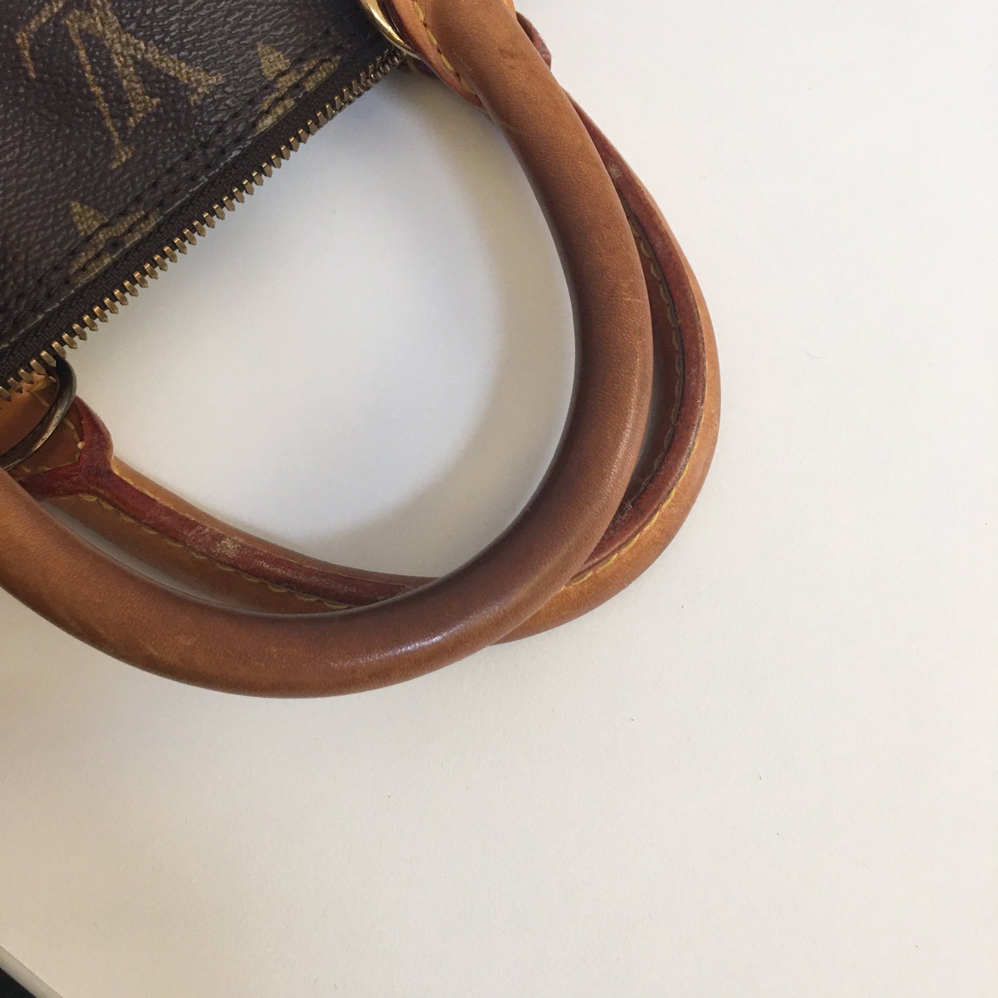 LOUIS VUITTON Alma Handbag in Brown Canvas