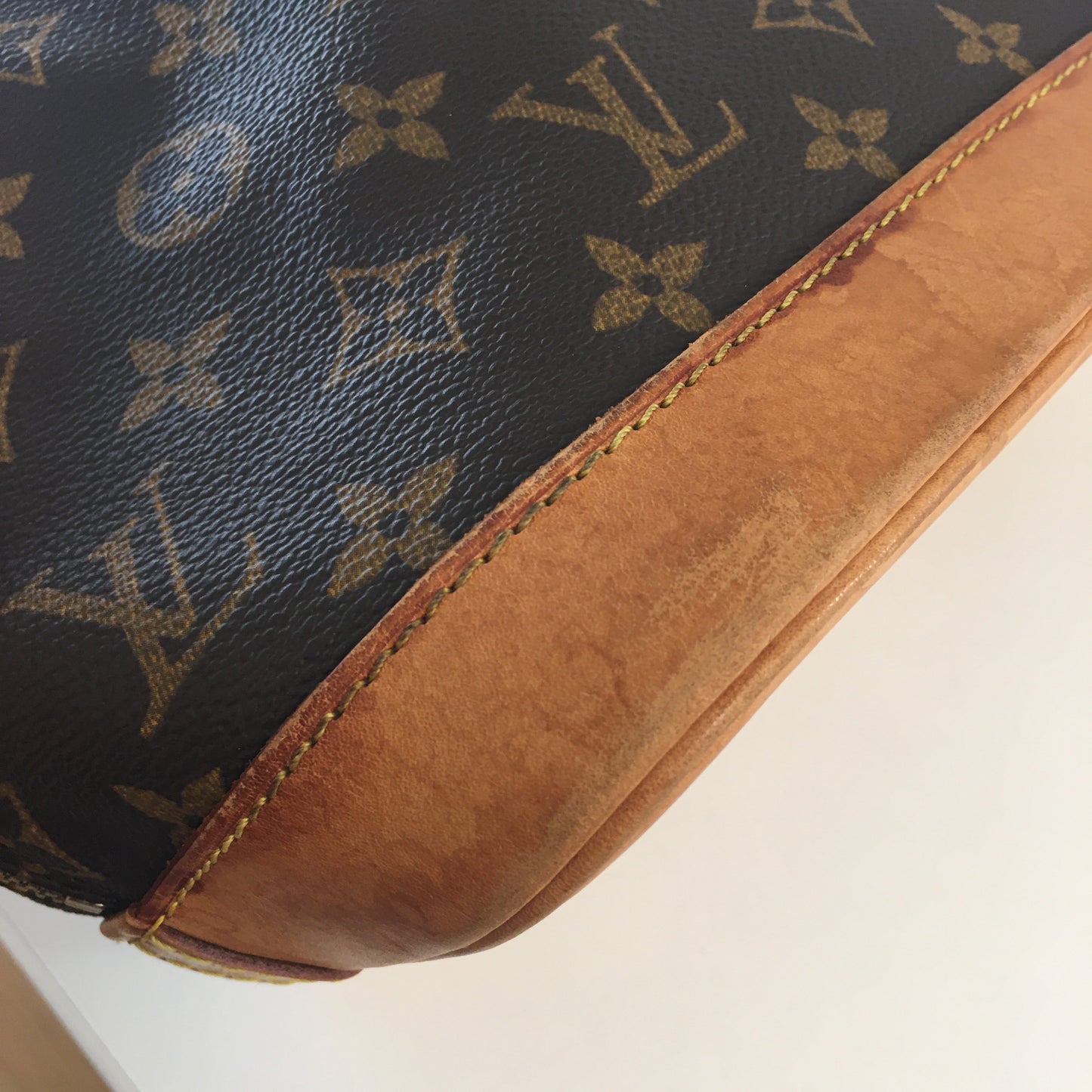 LOUIS VUITTON Alma Handbag in Brown Canvas