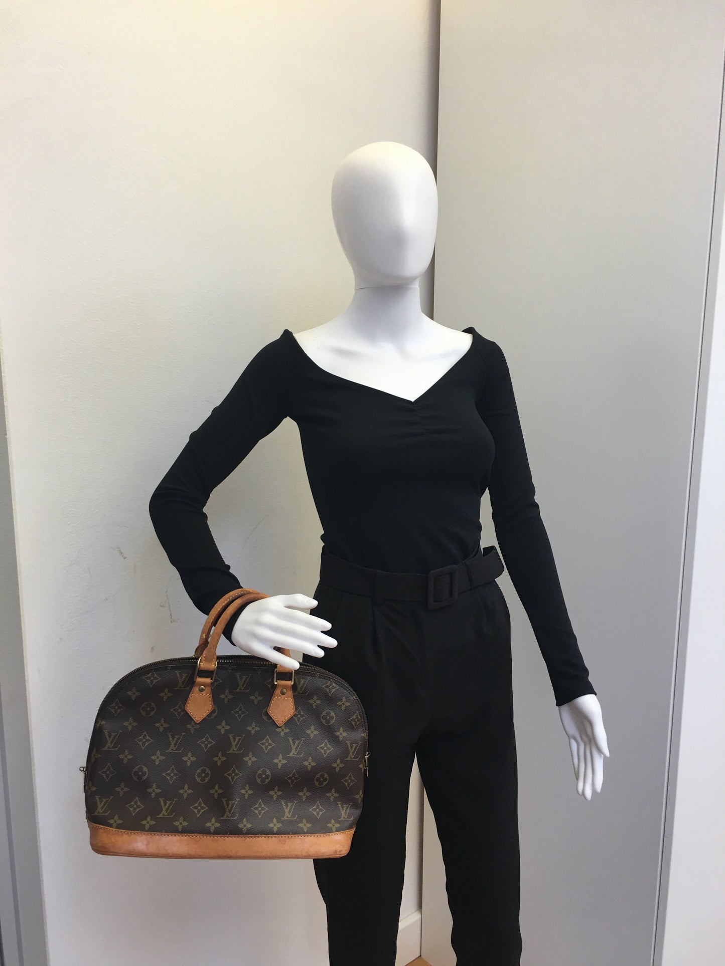 LOUIS VUITTON Alma Handbag in Brown Canvas