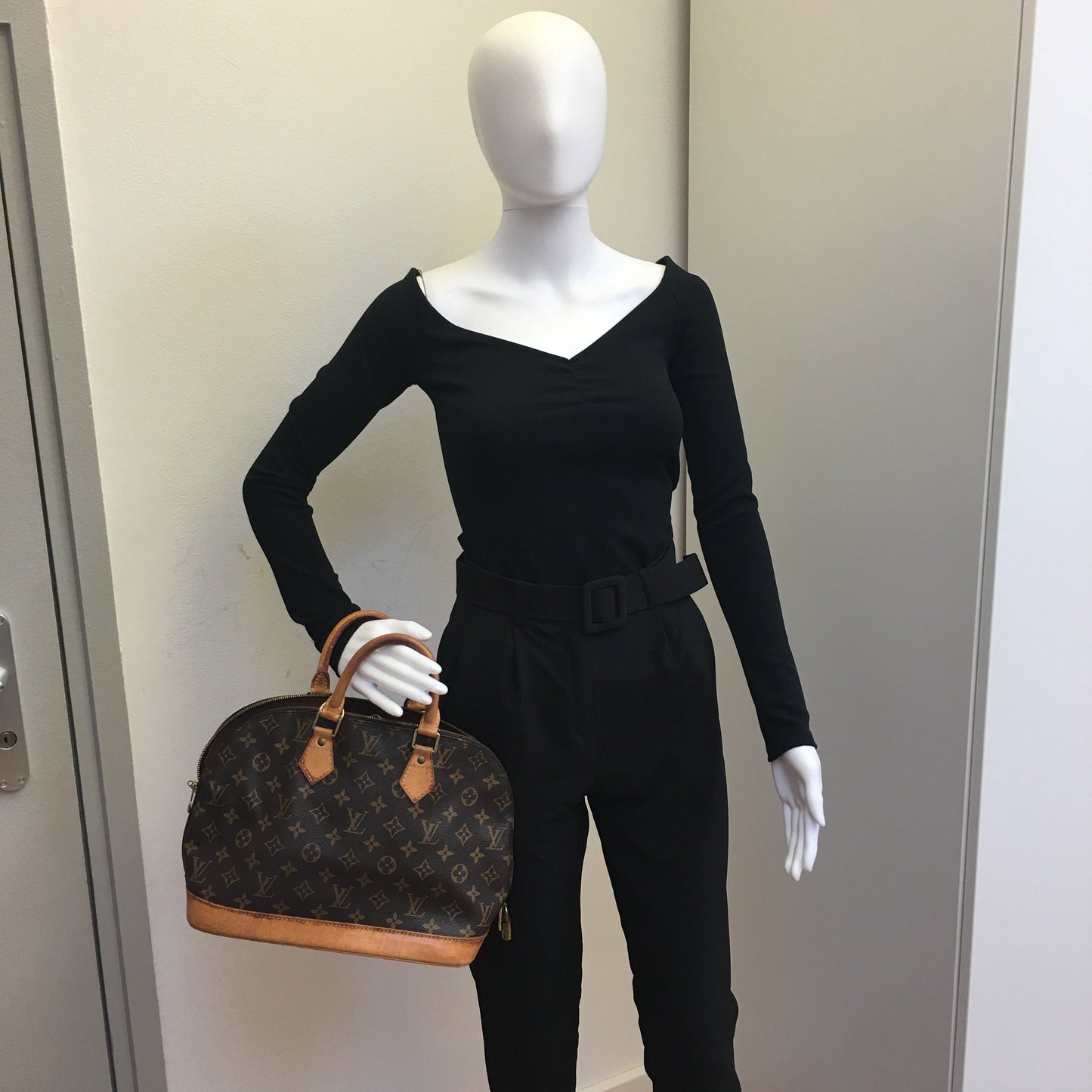 LOUIS VUITTON Alma Handbag in Brown Canvas