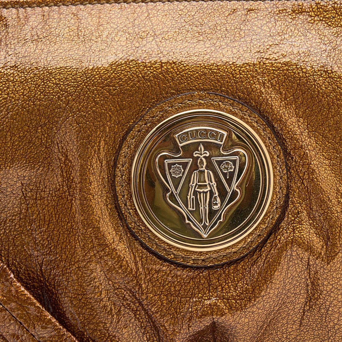 Gucci Gold Leather Hysteria Clutch