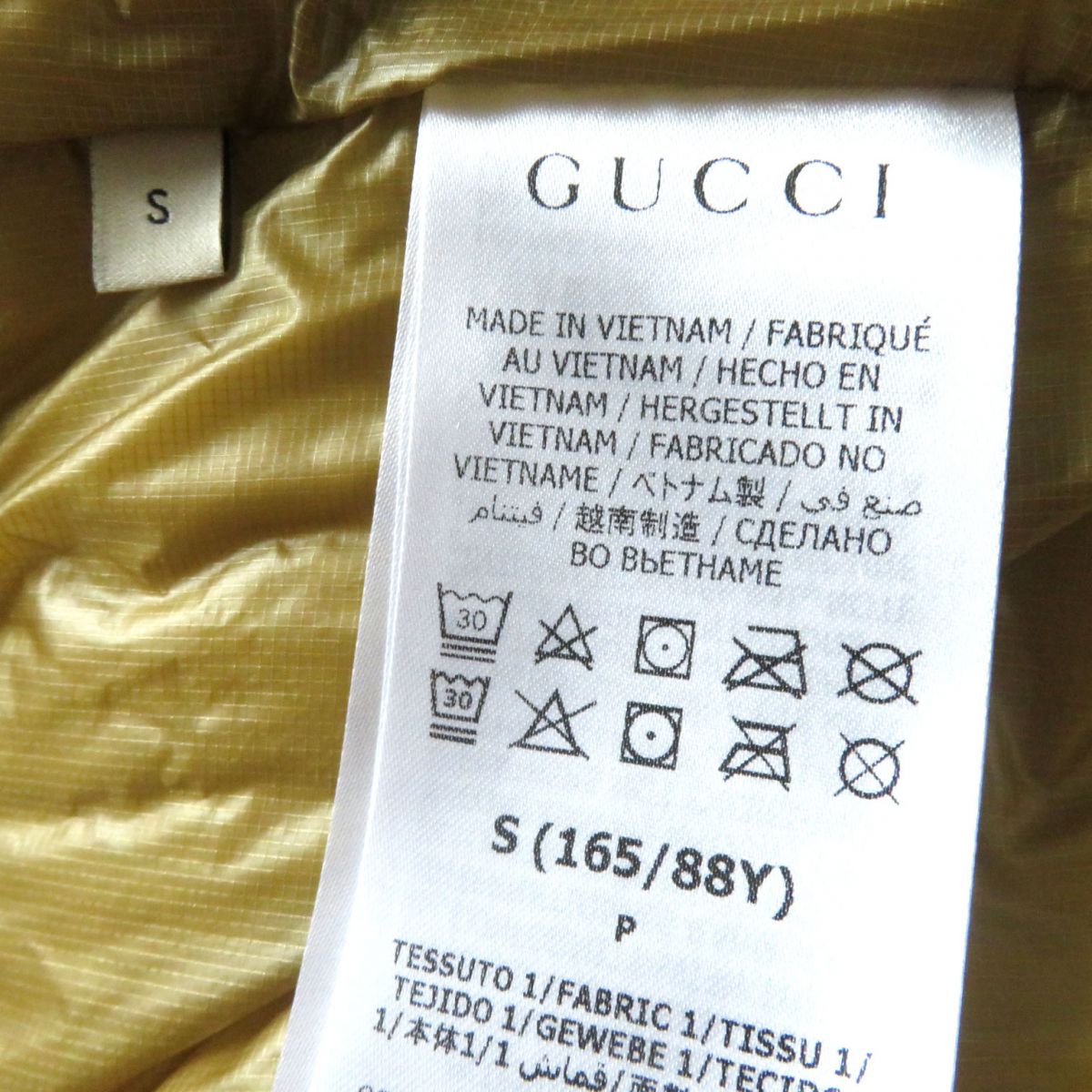 GUCCI Down jacket Outer: 88% nylon, Outer: 12% polyurethane, Lining: 100% nylon, Filling: 80% down, Filling: 20% feather, Part: 100% polyester Ivory Women S Used