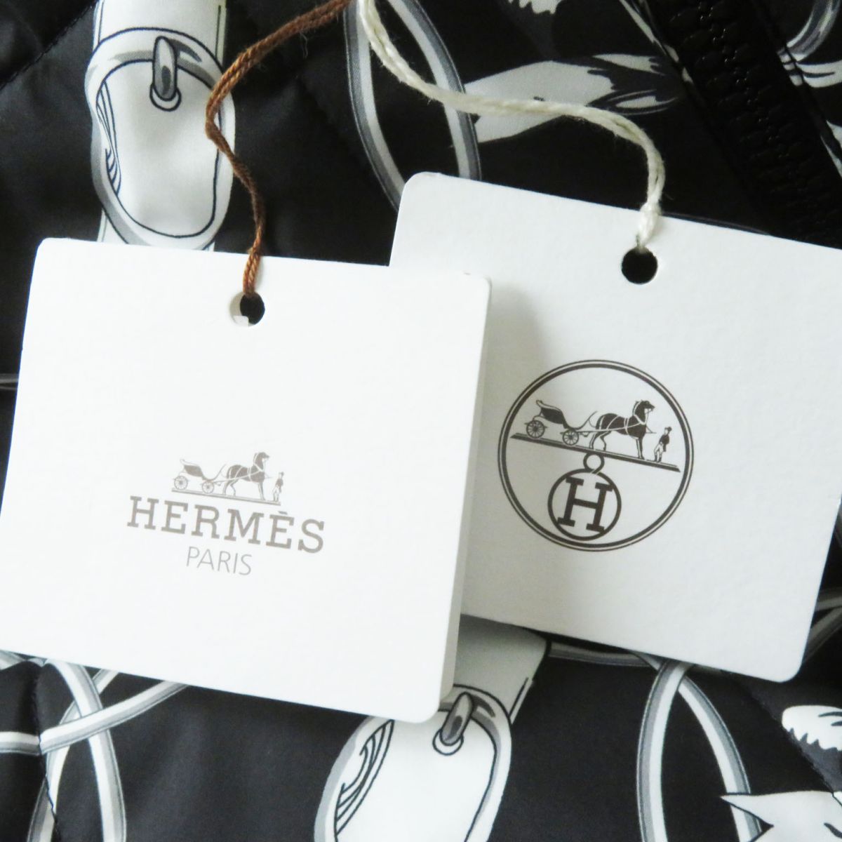 HERMES Down jacket Outer: 100% polyester, Part: 100% virgin wool, Lining: 100% polyester, Filling: 90% down, Filling: 10% feather, Padding: 100% polyester NOIR (Black x White)<br>La Promenade du Matin / Morning Walk Women 34 Used