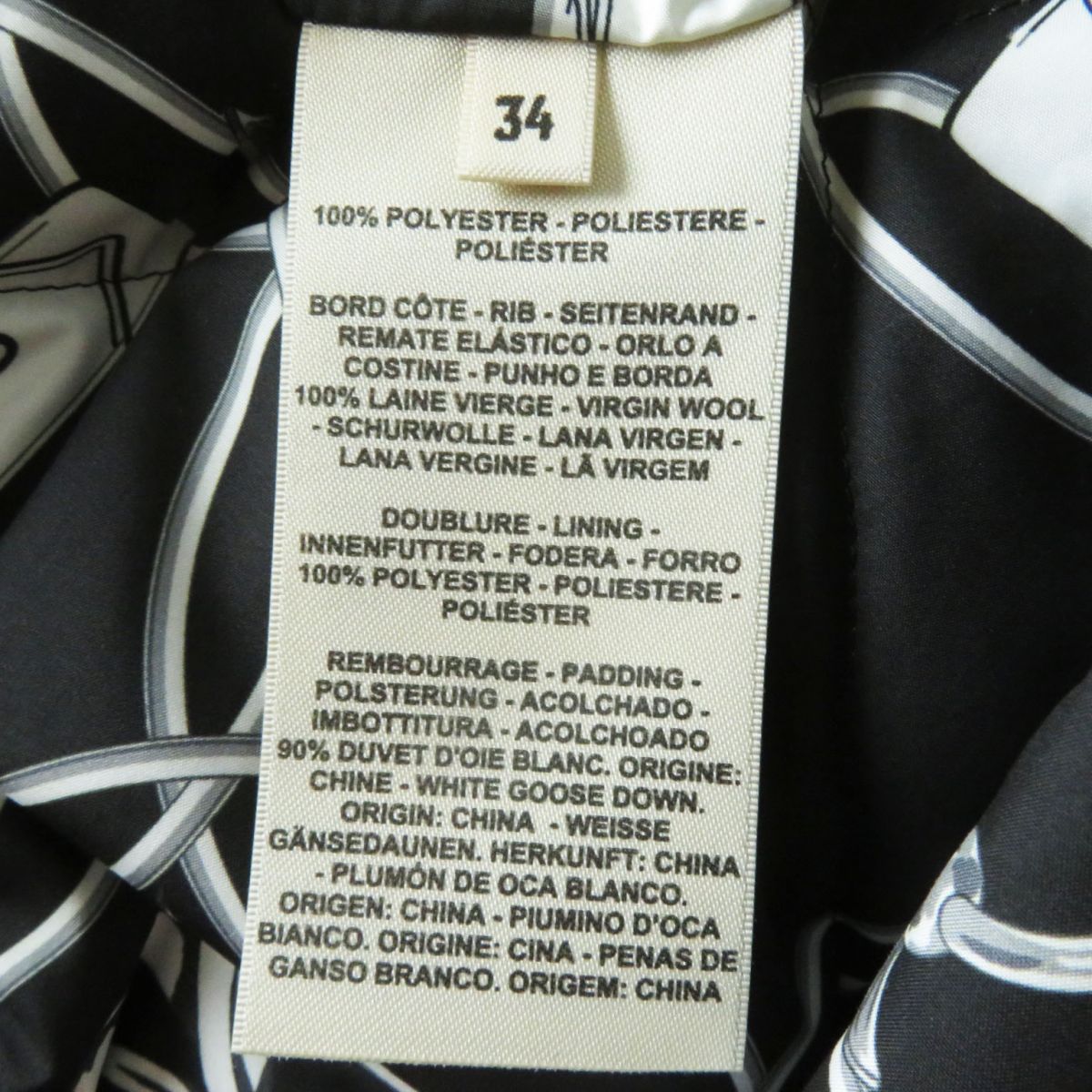 HERMES Down jacket Outer: 100% polyester, Part: 100% virgin wool, Lining: 100% polyester, Filling: 90% down, Filling: 10% feather, Padding: 100% polyester NOIR (Black x White)<br>La Promenade du Matin / Morning Walk Women 34 Used