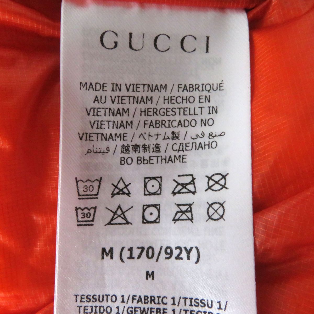 GUCCI Down jacket Outer: 100% nylon, Lining: 100% nylon, Part: polyurethane, Filling: 80% down, Filling: 20% feather, Part: 100% polyester Outer: Blue<br>Lining: Orange Women M Used