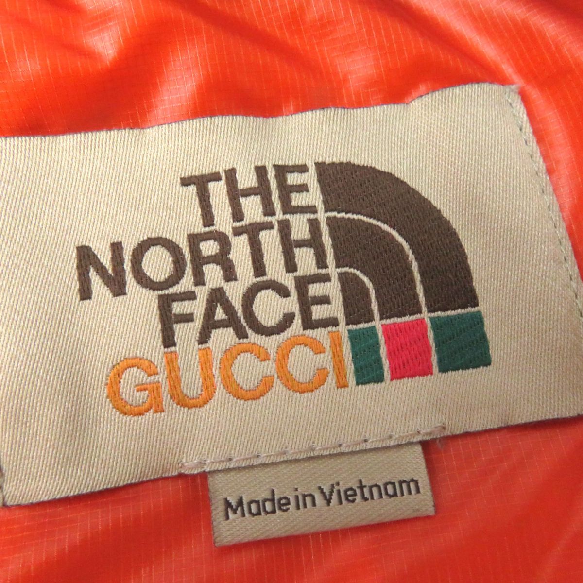 GUCCI Down jacket Outer: 100% nylon, Lining: 100% nylon, Part: polyurethane, Filling: 80% down, Filling: 20% feather, Part: 100% polyester Outer: Blue<br>Lining: Orange Women M Used