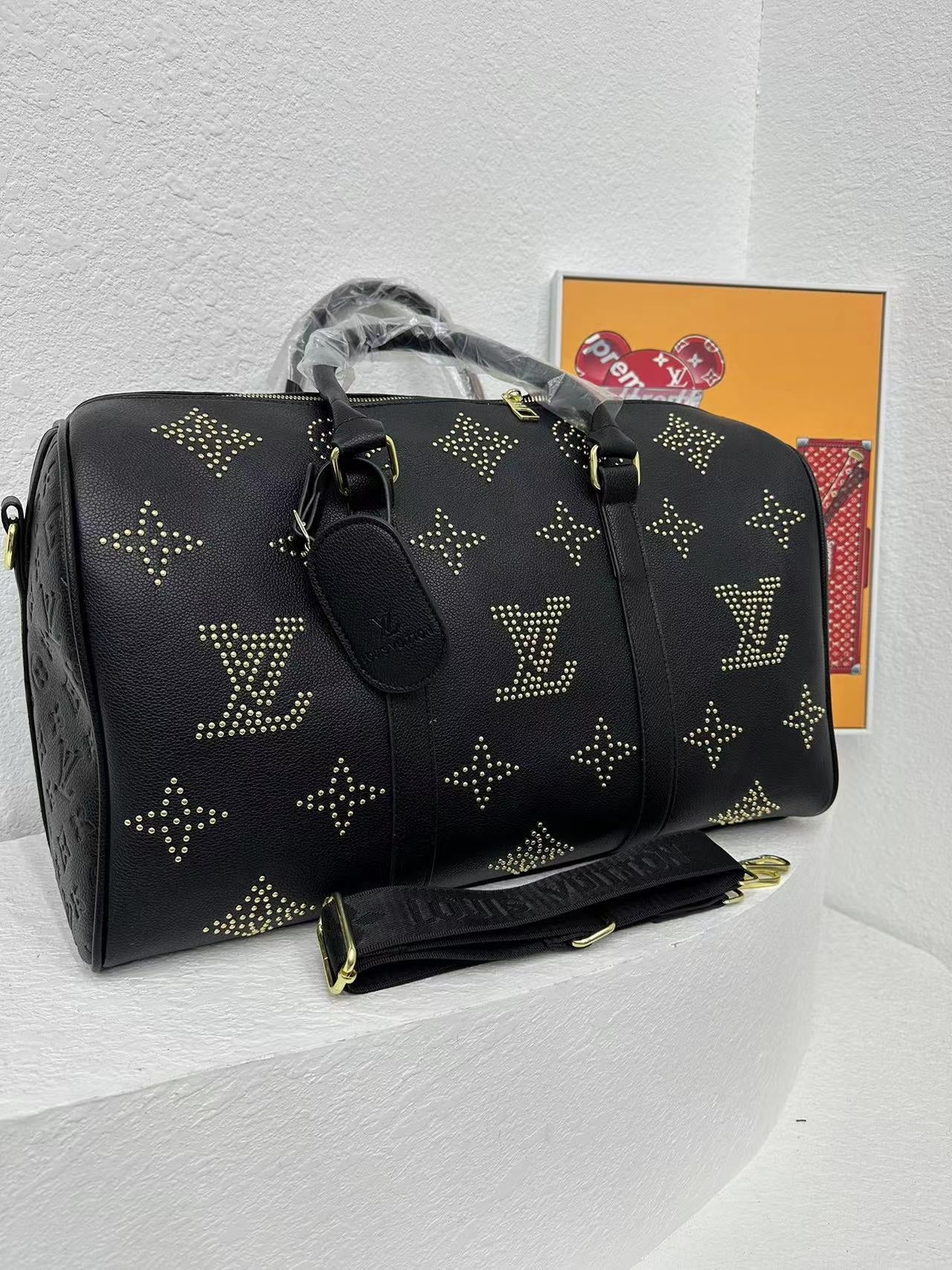 Louis vuitton handbag ( weekender / traveling bag)