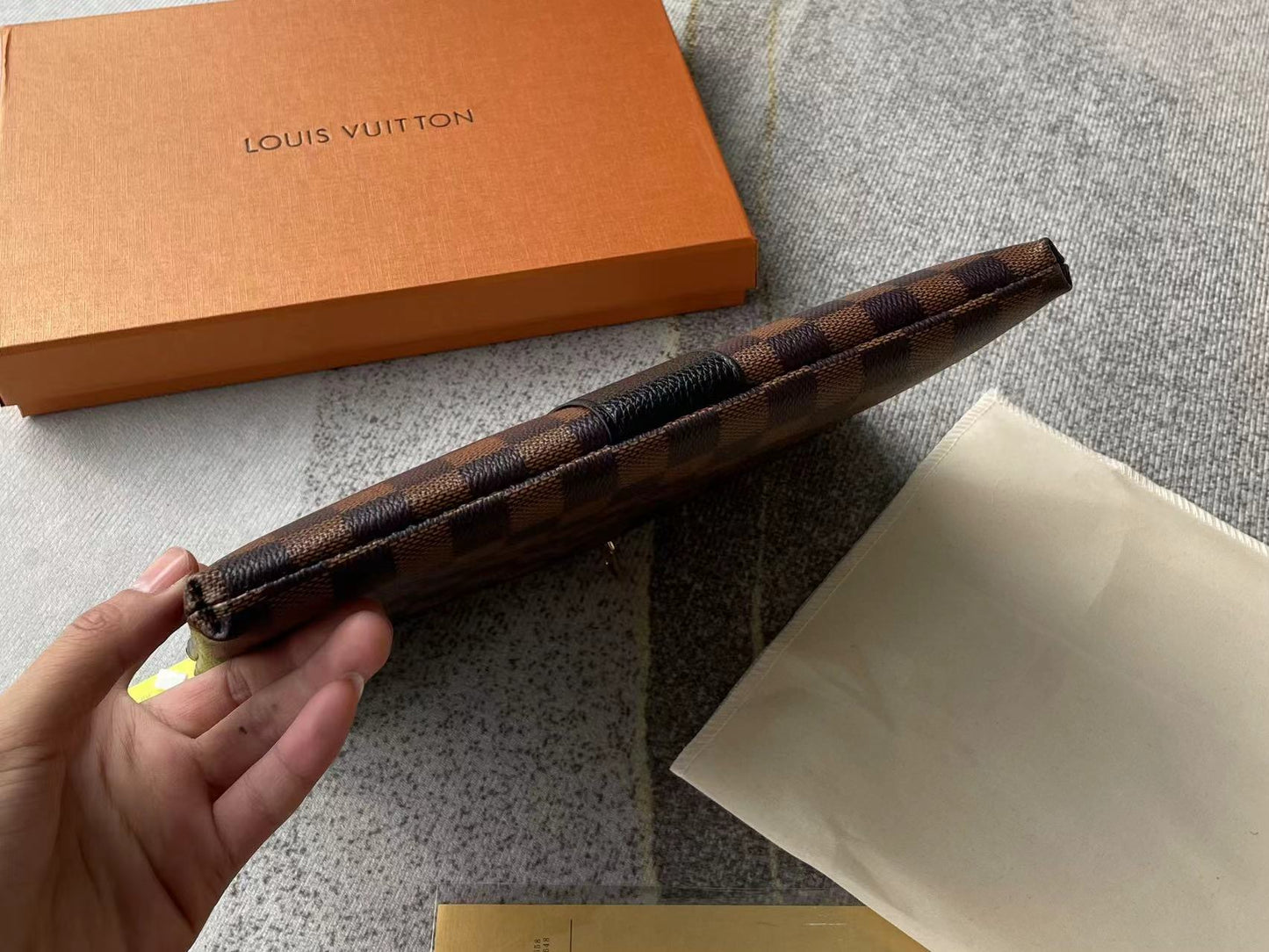 Louis vuitton handbag (wristlet   bag)
