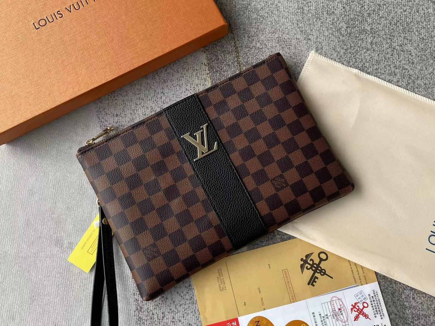 Louis vuitton handbag (wristlet   bag)