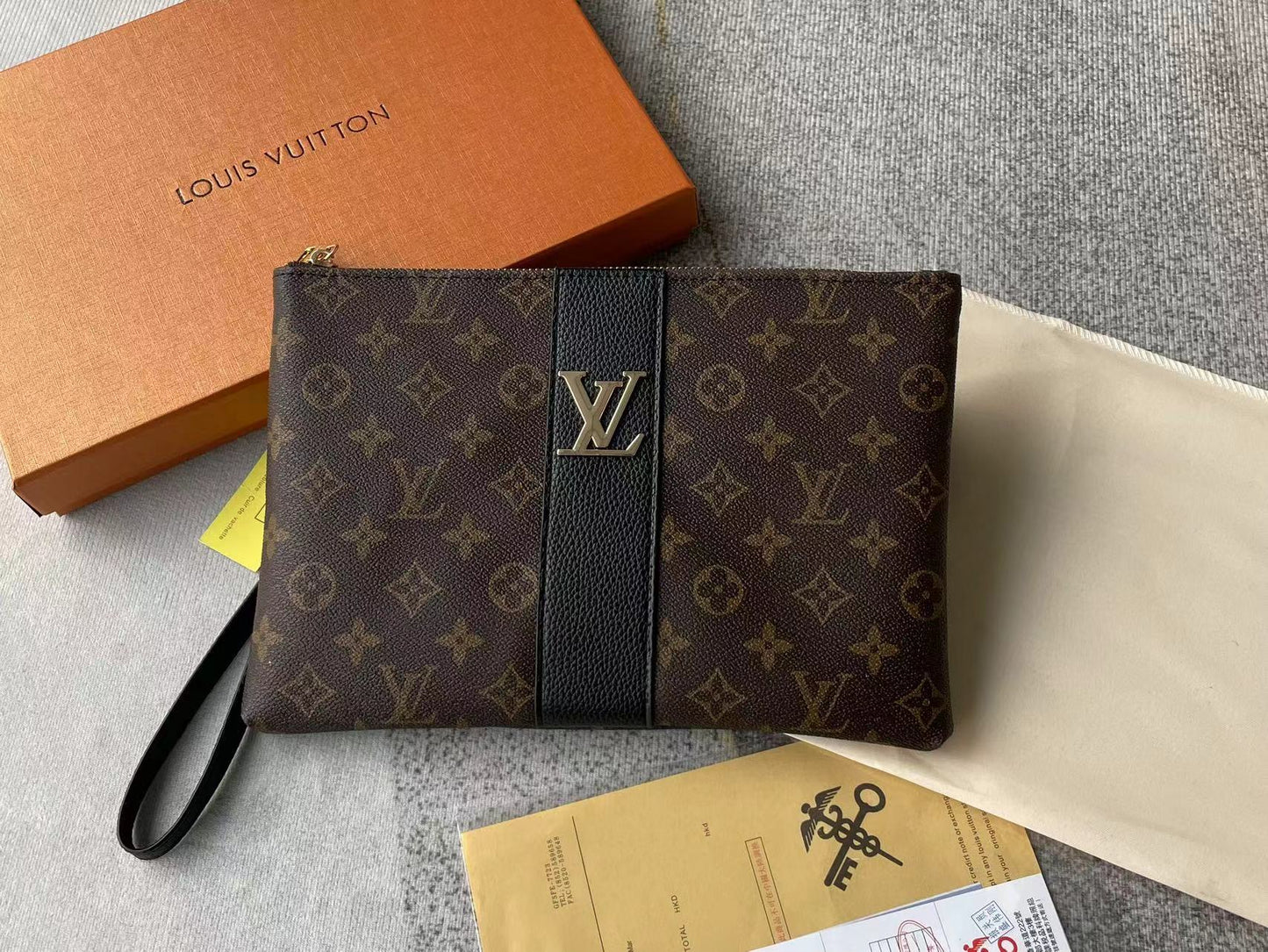 Louis vuitton handbag (wristlet   bag)