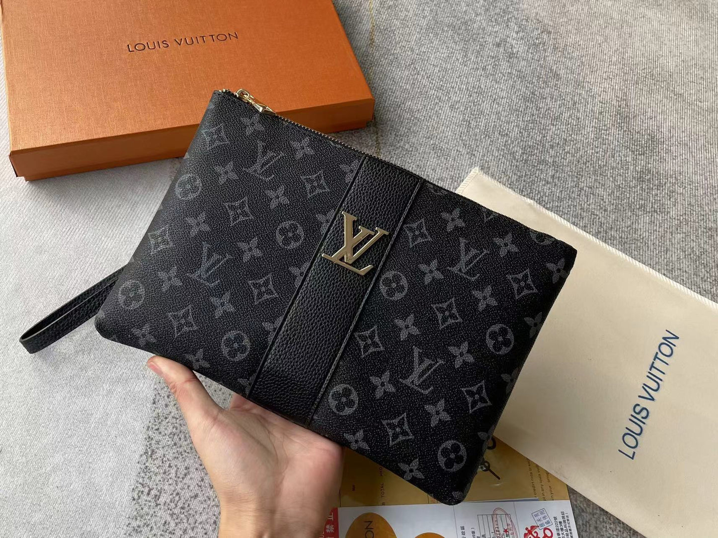 Louis vuitton handbag (wristlet   bag)