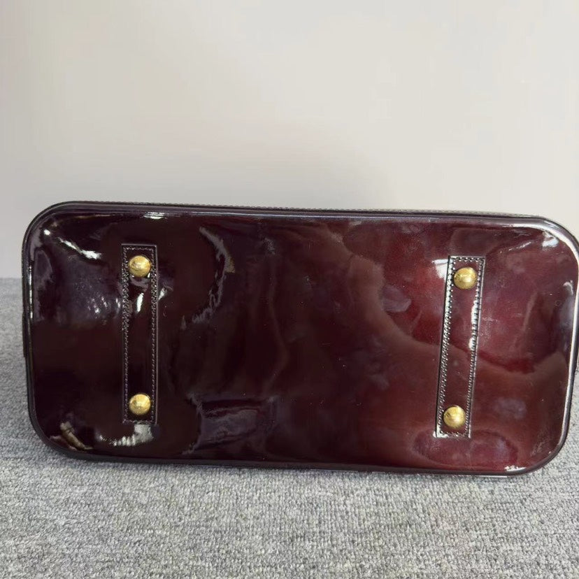 Louis Vuitton Alma Amarante Vernis Leather Handbag Medium