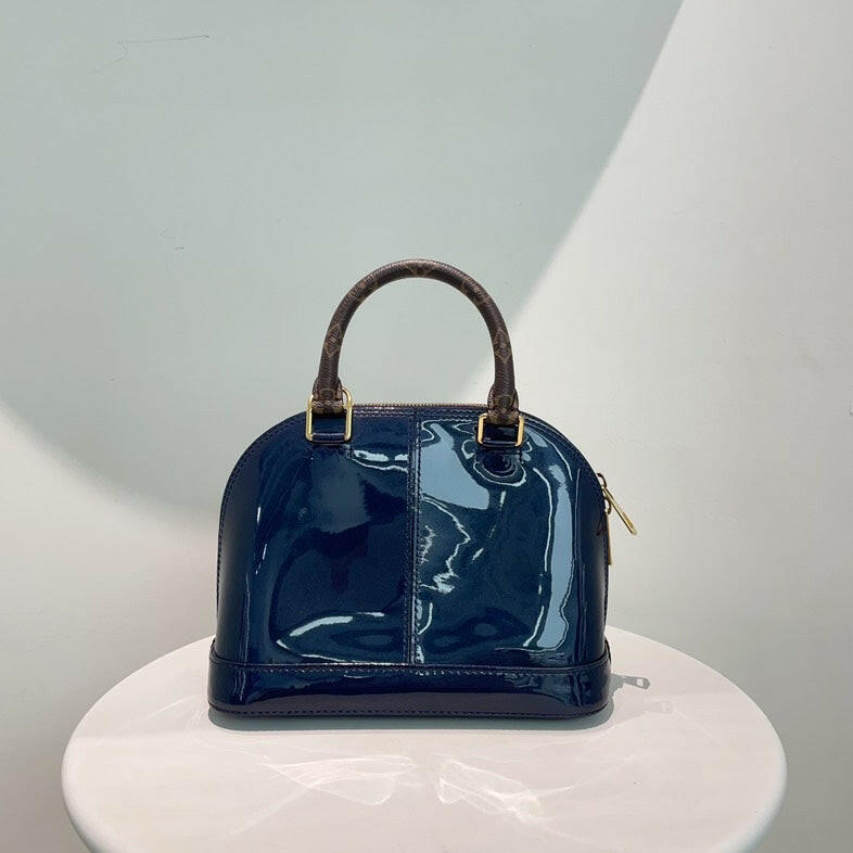 Louis Vuitton Alma Bag in Patent Navy Blue with Monogram Handles and Strap - Medium Size