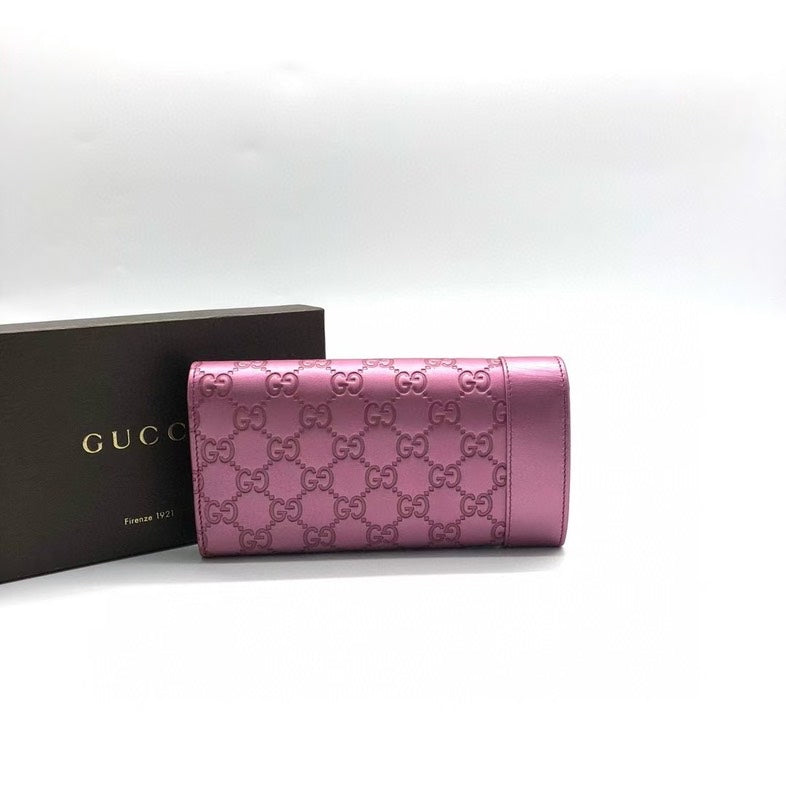 Gucci Pink Embossed Leather Wallet