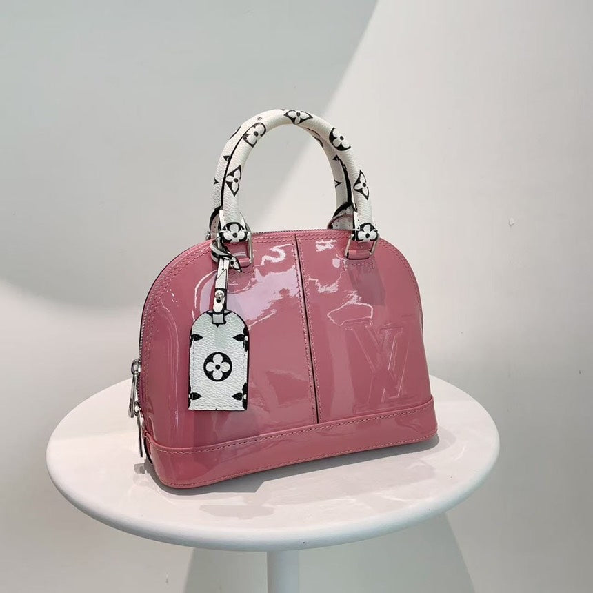 Louis Vuitton Alma Rose Vernis Leather Handbag Medium