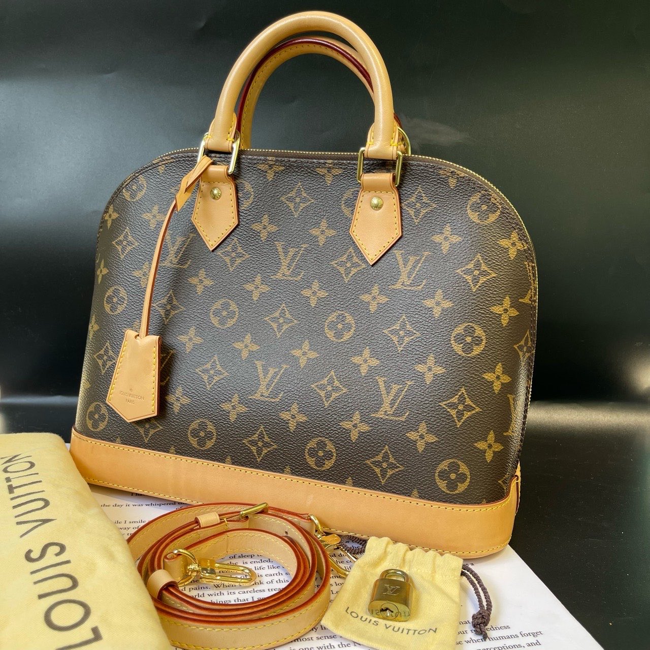 Louis Vuitton Alma Monogram Canvas Brown Handbag 31x15x23 cm