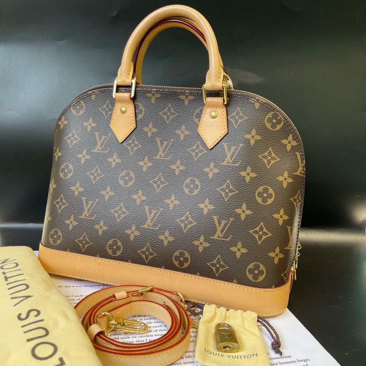 Louis Vuitton Alma Monogram Canvas Brown Handbag 31x15x23 cm