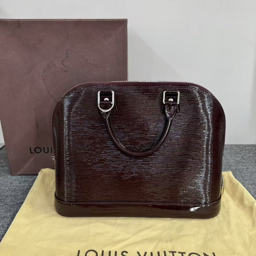 Louis Vuitton Alma Bag Amarante Handbag