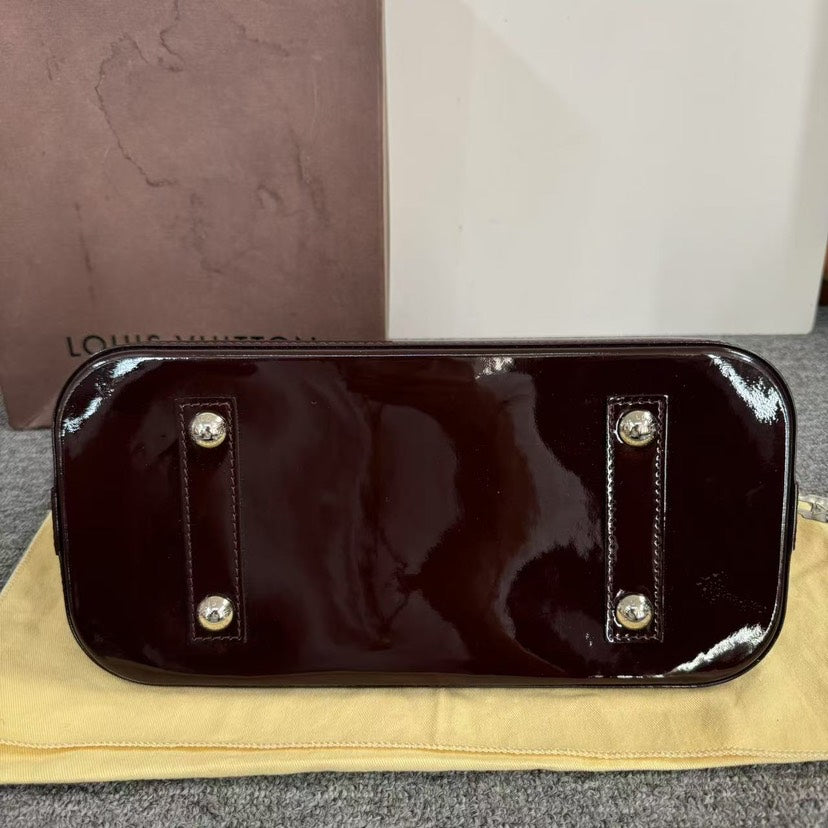 Louis Vuitton Alma Bag Amarante Handbag
