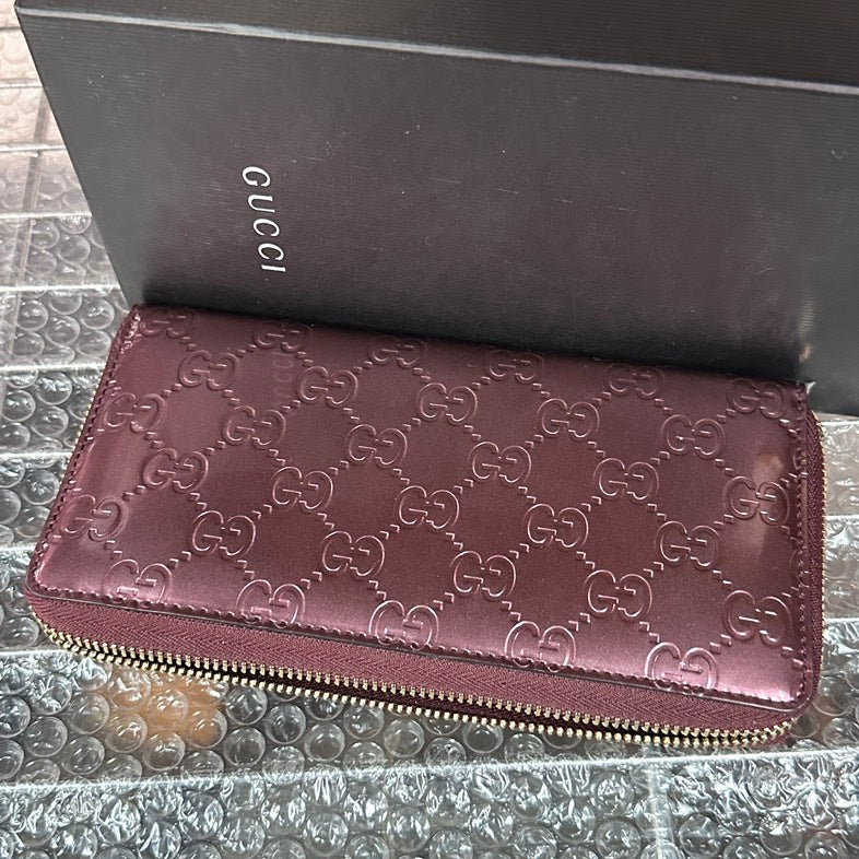 Gucci GG Embossed Burgundy Leather Wallet