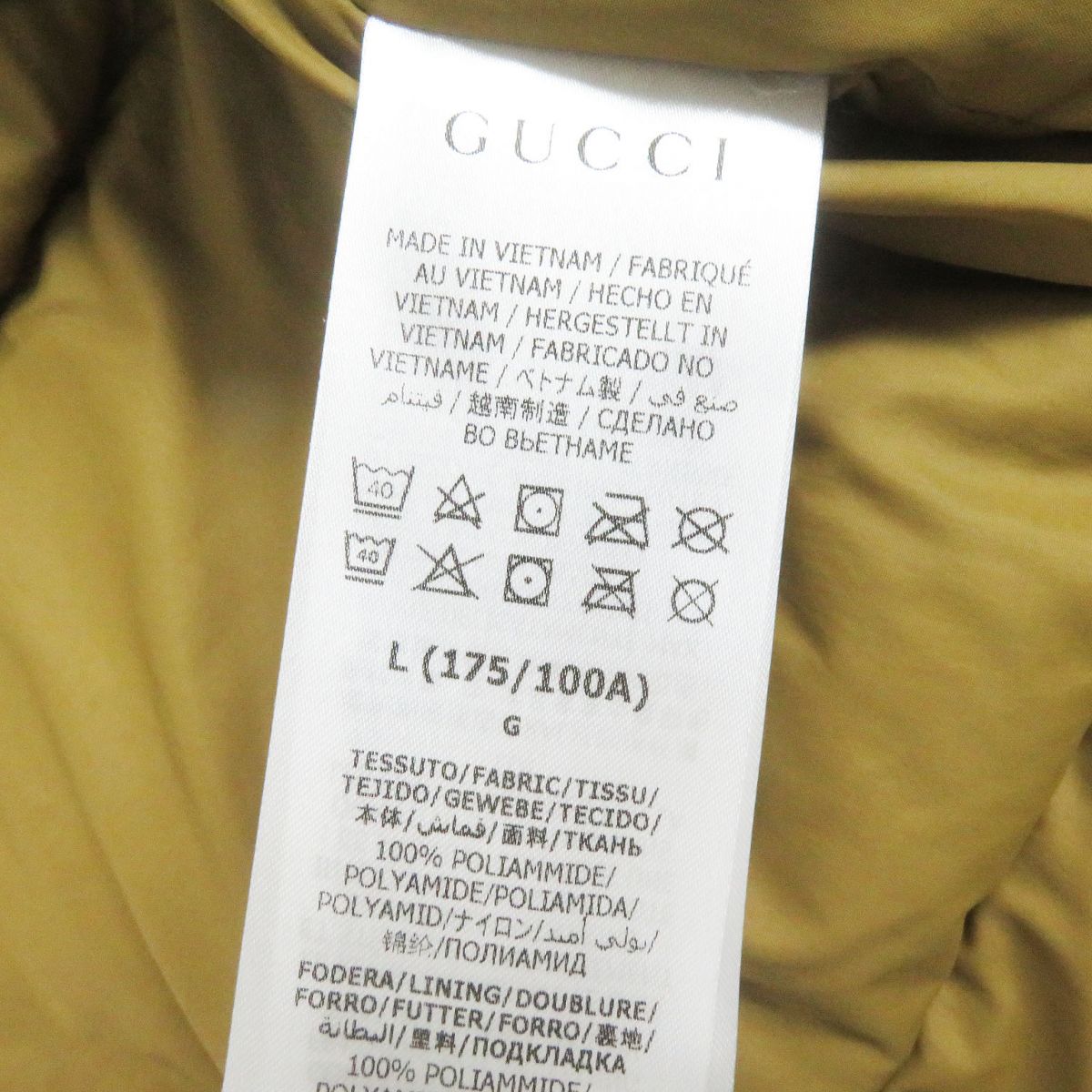 GUCCI Down jacket 100% nylon<br> Filling: Down 80%, Feather 20%<br> Applique: 100% polyester<br> multicolor mens Used